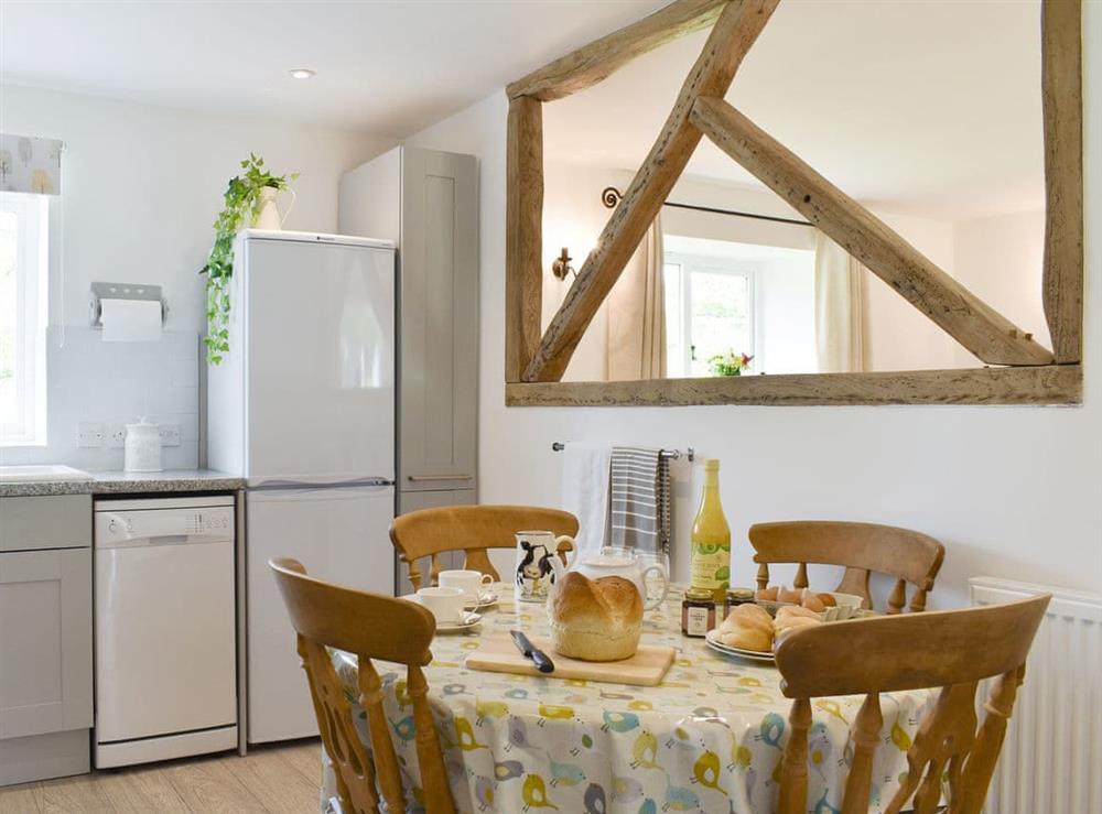 Convenient dining area within kitchen at Cherry Cottage, 