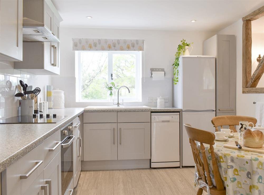 Fully appointed kitchen with dining area at Cherry Cottage, 