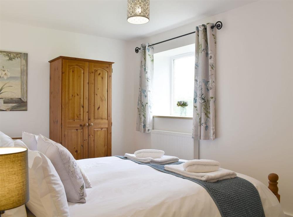 Peaceful double bedroom at Cherry Cottage, 