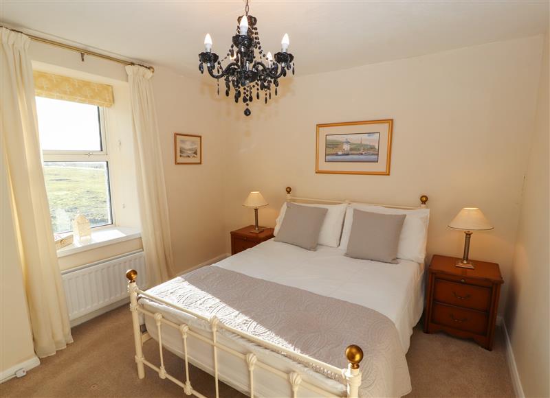 One of the bedrooms at Woodbine Cottage, Allonby