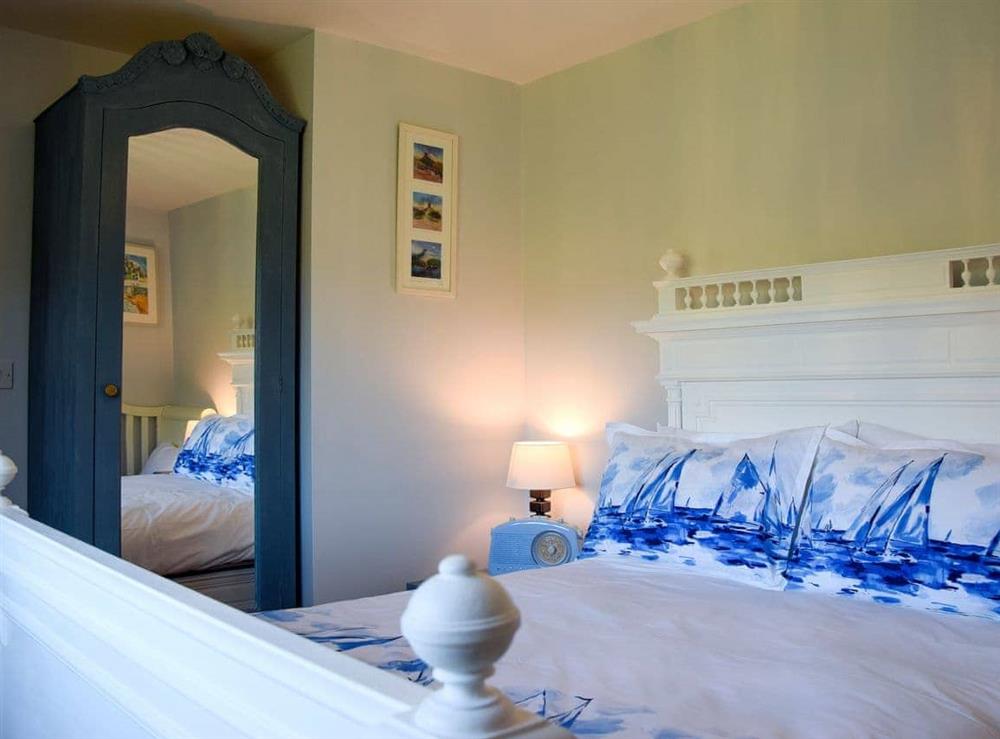 Comfortable double bedroom (photo 2) at Woodbrook Cottage in Bothenhampton, near Bridport, Dorset
