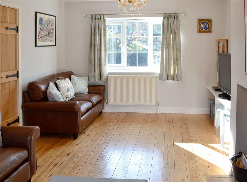 Spacious living room at Woodbrook Cottage in Bothenhampton, near Bridport, Dorset