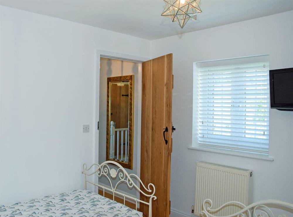 Twin bedroom (photo 2) at Woodbrook Cottage in Bothenhampton, near Bridport, Dorset