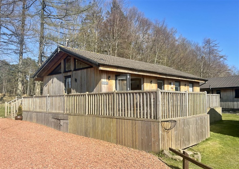 The setting of Woodburn Lodge at Woodburn Lodge, Otterburn
