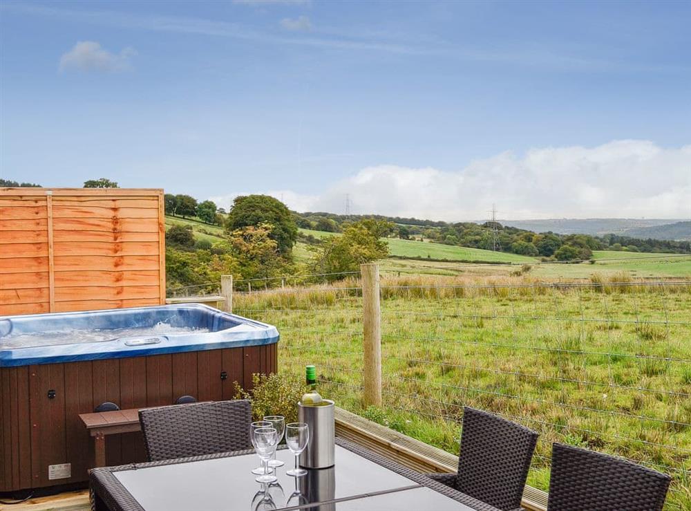 Delightful views of the surrounding countryside from the secluded hot tub on the decking area at The Clyde, 
