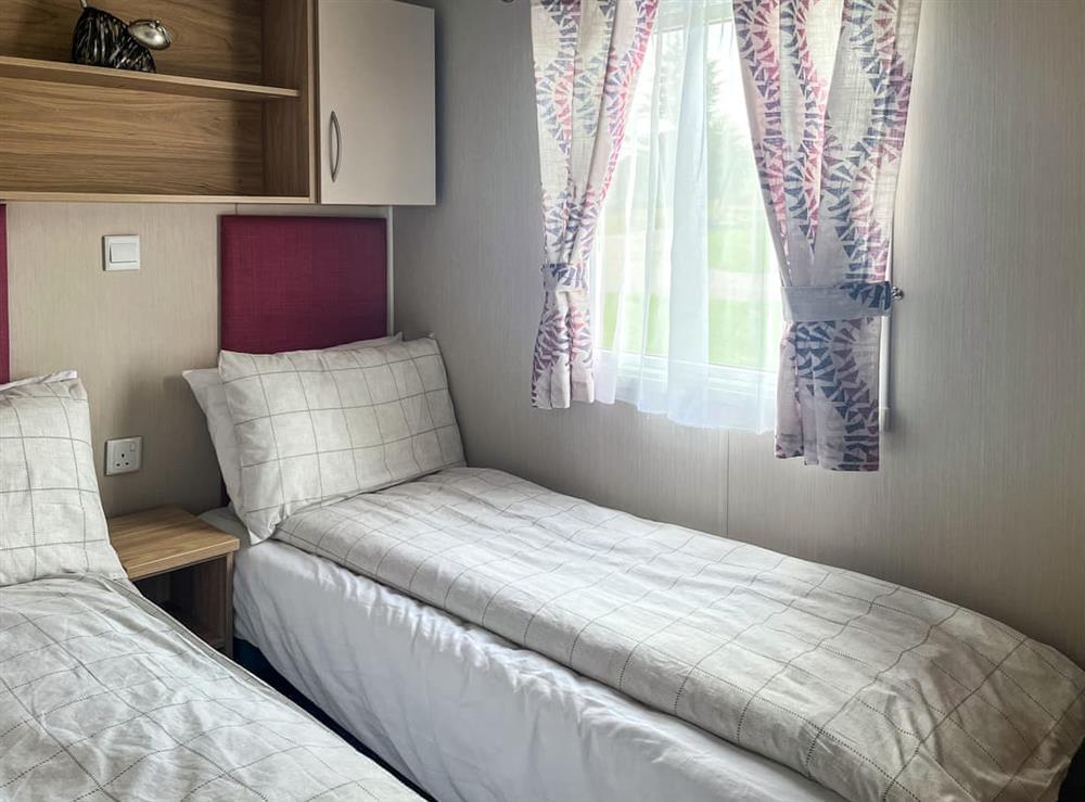 Twin bedroom at Woodend Caravan in Lairg, Sutherland