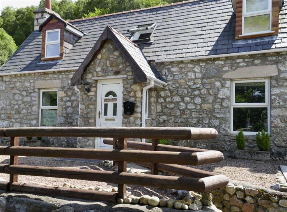 Traditional stone, detached cottage at Woodend in Fort William, Highlands, Inverness-Shire