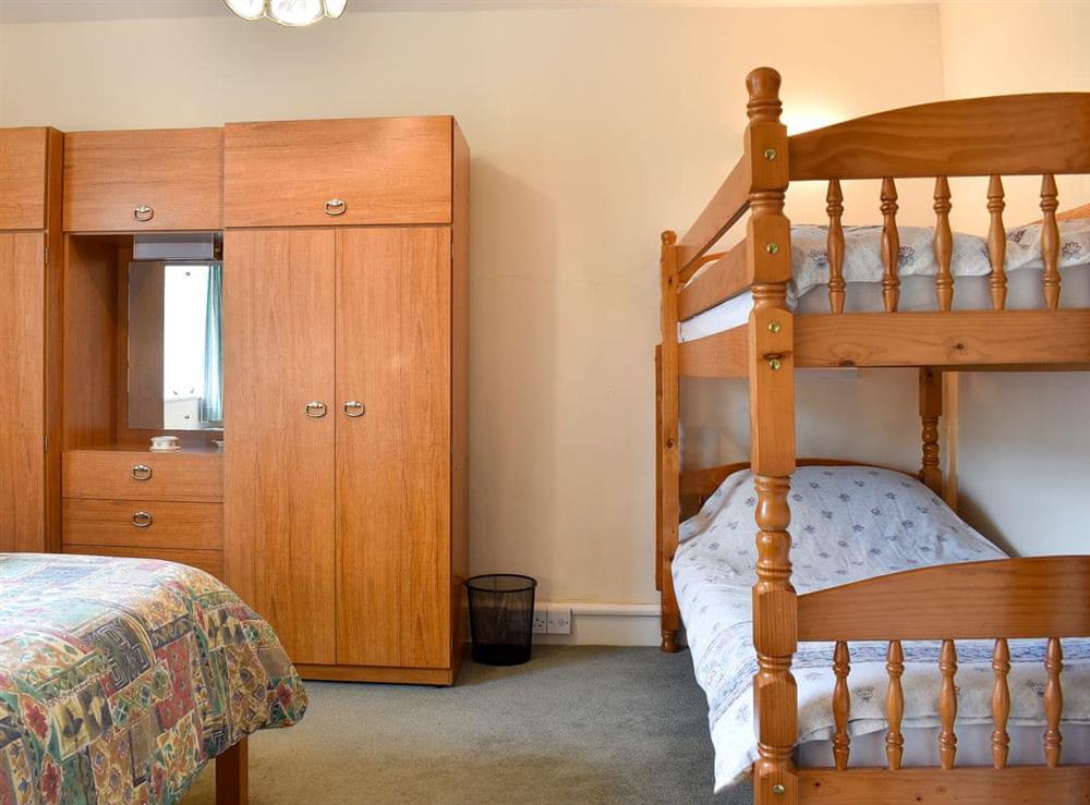 Relaxing double bedroom with additional bunk bed (photo 2) at Honeybags, 