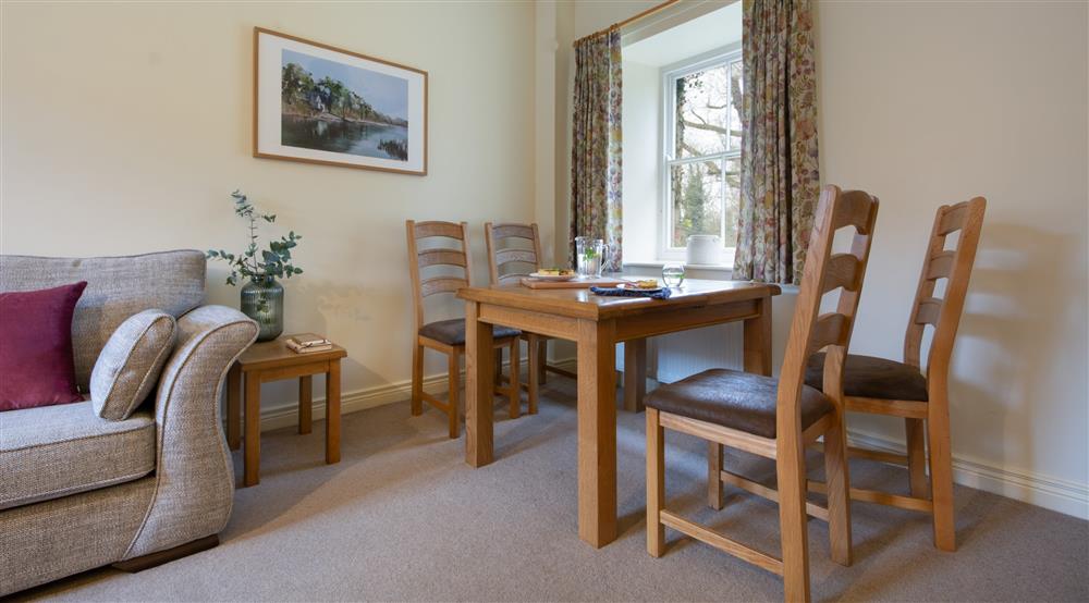 The sitting and dining room (photo 2) at Woodford Cottage in Newtownbutler, County Fermanagh