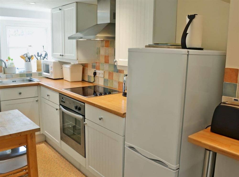 Immaculately presented kitchen at Woodford Cottage in Rosudgeon, near Penzance, Cornwall