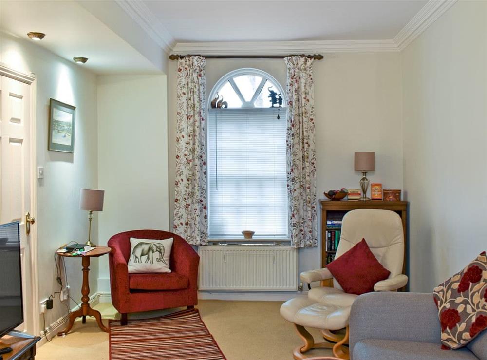 Cosy living/dining room at Woodford House in Bognor Regis, West Sussex