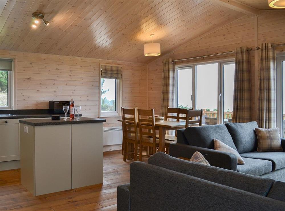 Cosy seating, bright dining area and lovely kitchen at Ben Wyvis, 