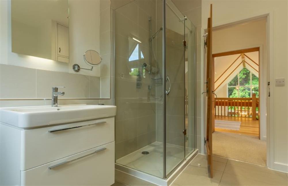 First floor: Family bathroom with large walk-in shower at Woodland Pytchley, West Runton near Cromer
