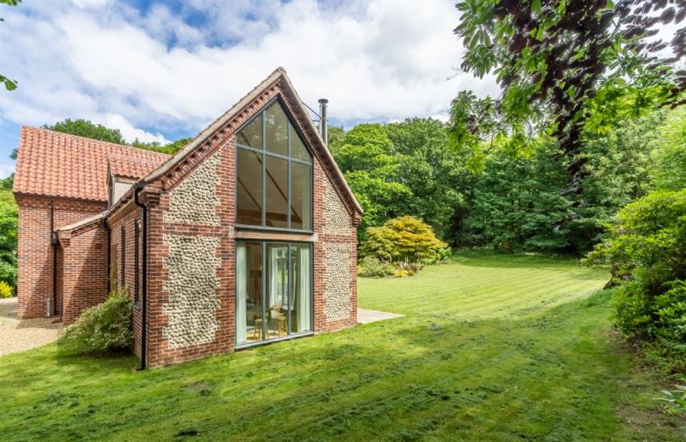 Floor to ceiling windows allow lots of light into the property at Woodland Pytchley, West Runton near Cromer