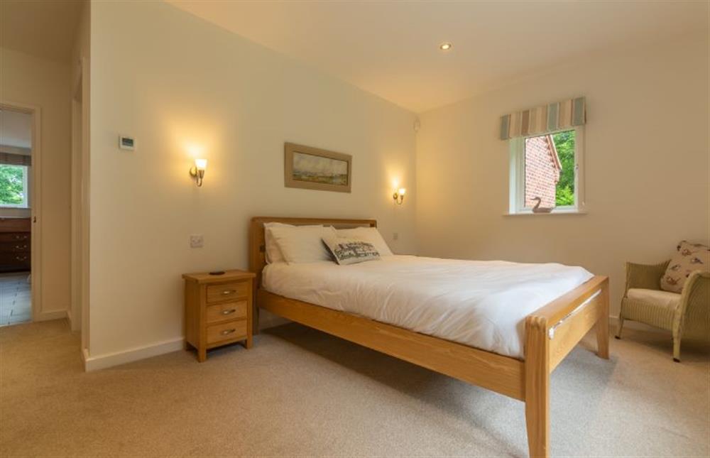 Ground floor: Master bedroom with king-size bedroom (photo 2) at Woodland Pytchley, West Runton near Cromer