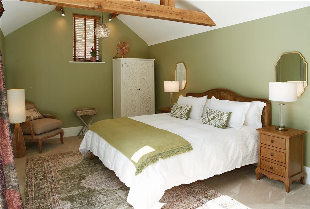 The relaxing bedroom with a super-king size bed at Woodland Retreat, Burton on Trent