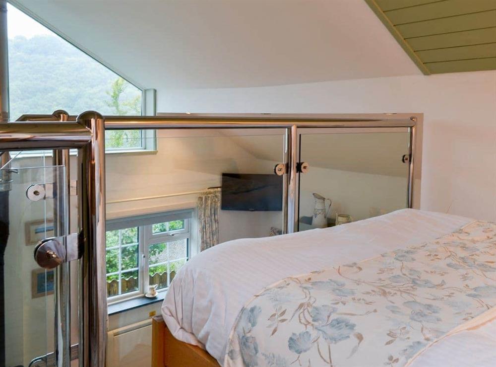 Galleried double bedroom (photo 2) at Woodland Retreat in Polbrock, Washaway, Cornwall., Great Britain
