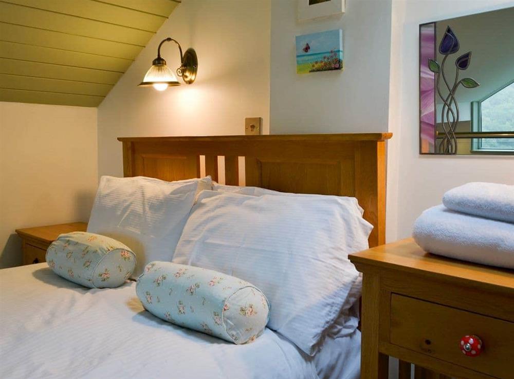 Galleried double bedroom at Woodland Retreat in Polbrock, Washaway, Cornwall., Great Britain