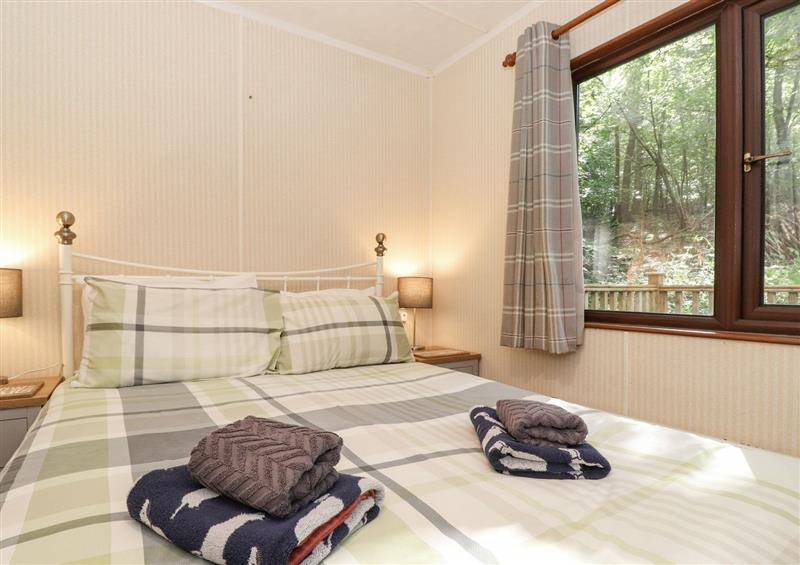 A bedroom in Woodland Retreat at Woodland Retreat, Skiptory Howe 41A