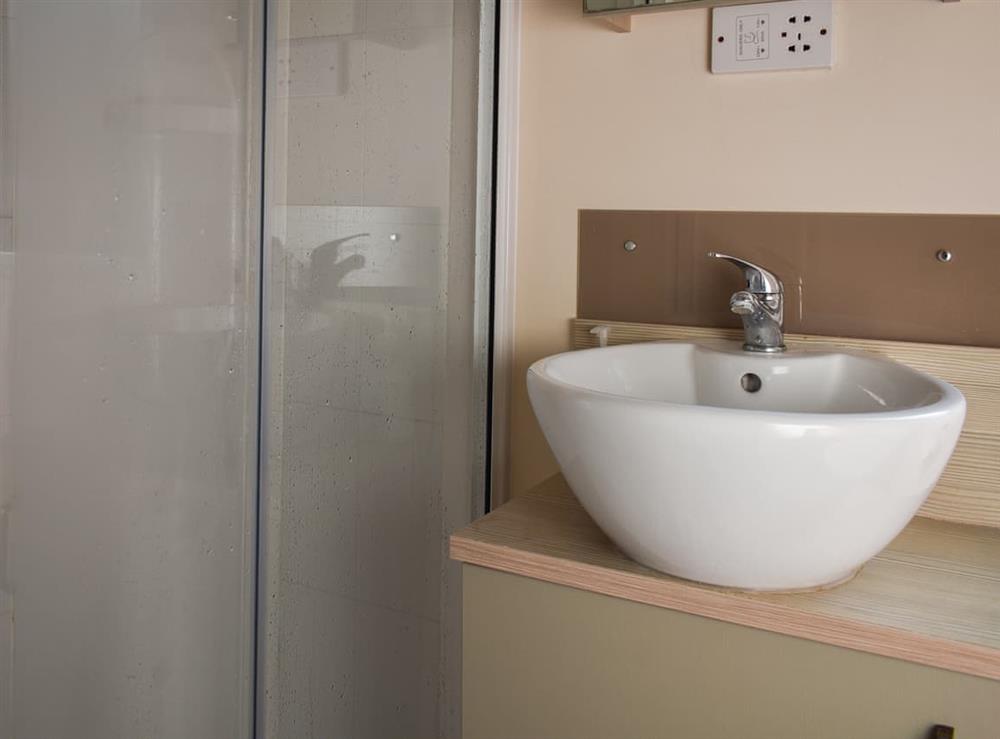 Shower room at Woodland Retreats in Kelling Heath, Norfolk