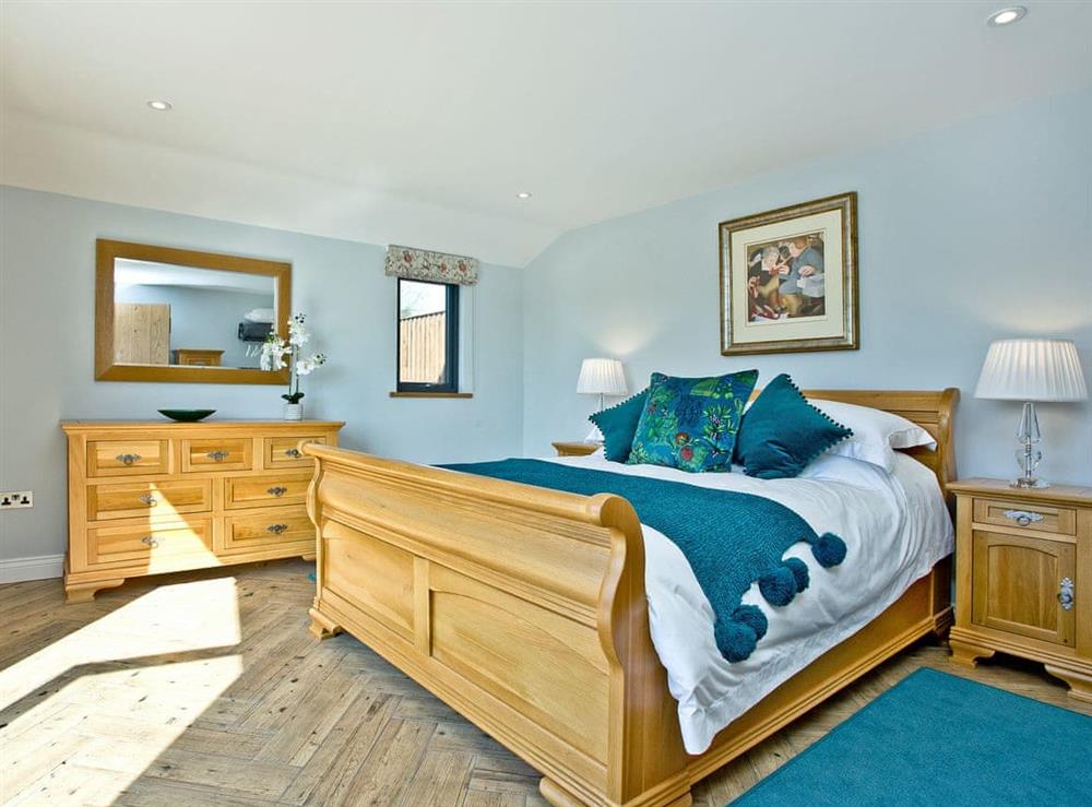 Relaxing double bedroom with beautiful views (photo 3) at Woodland View Lodge in Axminster, Devon