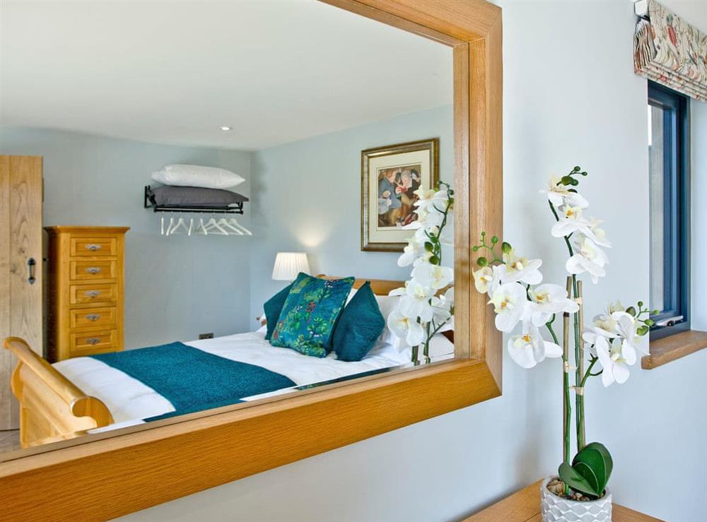 Relaxing double bedroom with beautiful views (photo 4) at Woodland View Lodge in Axminster, Devon
