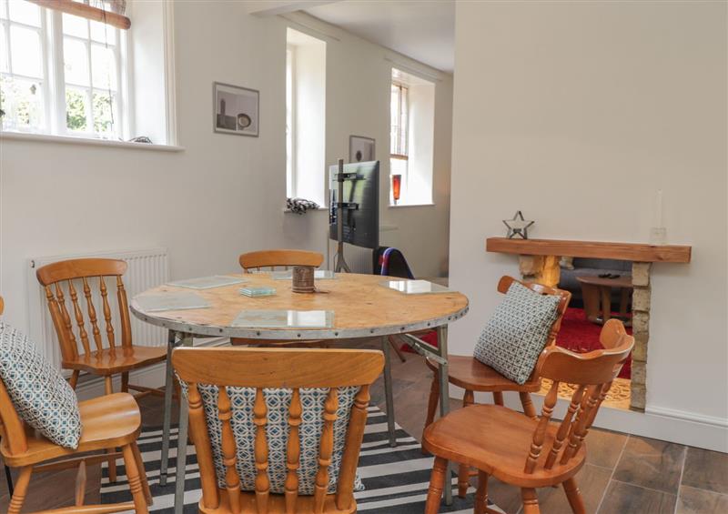 This is the dining room at Woodlands By The Sea Cottage, Sholden