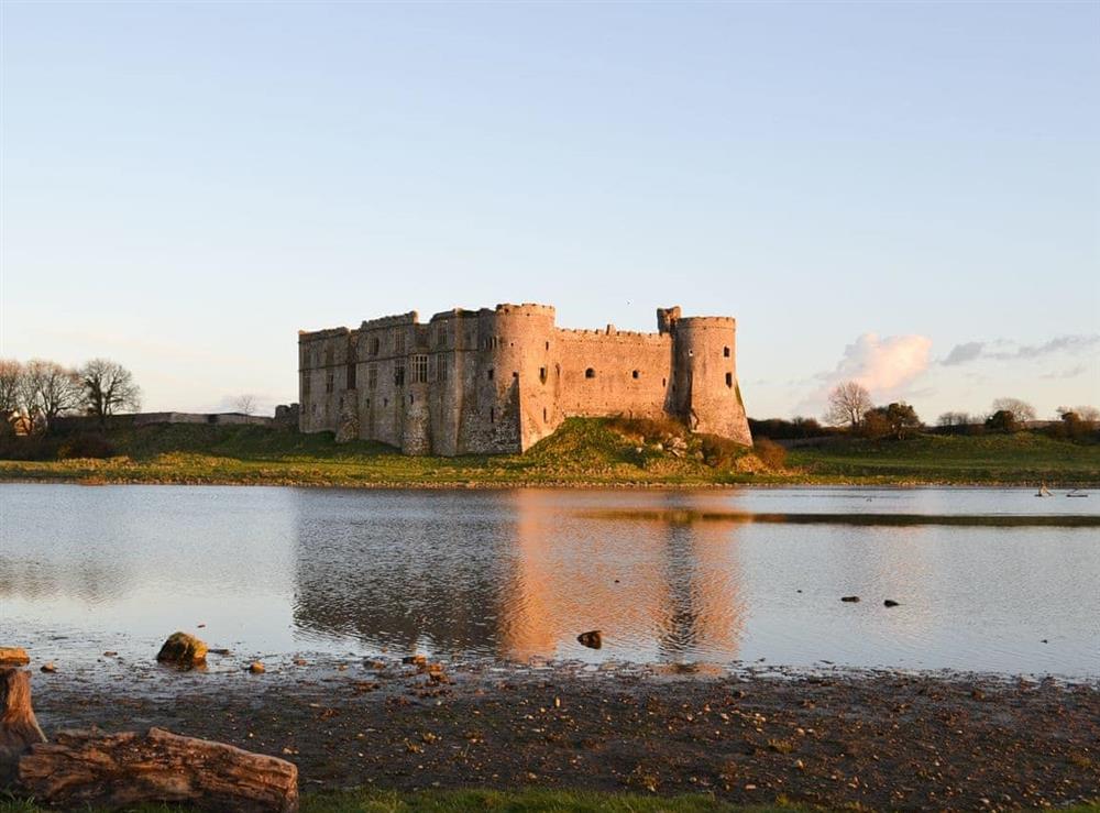 Carew Castle at Woodlands Cottage in Hook, near Haverfordwest, Dyfed