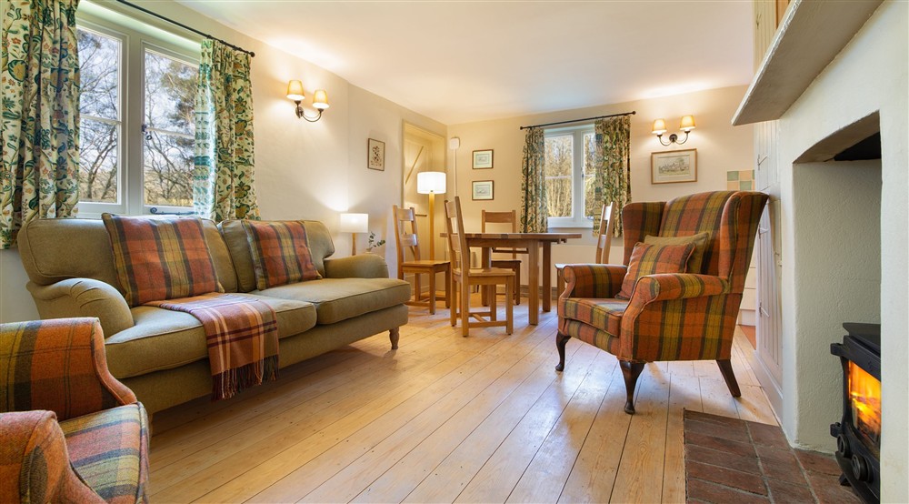 The sitting and dining areas at Woodlands Cottage in Nr Haywards Heath, West Sussex