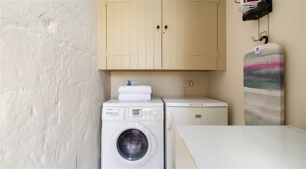 The utility room at Woodlands Cottage in Nr Haywards Heath, West Sussex
