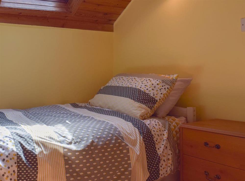 Single bedroom with Velux window at Woodlands in Laugharne, near Pendine, Carmarthenshire, Dyfed