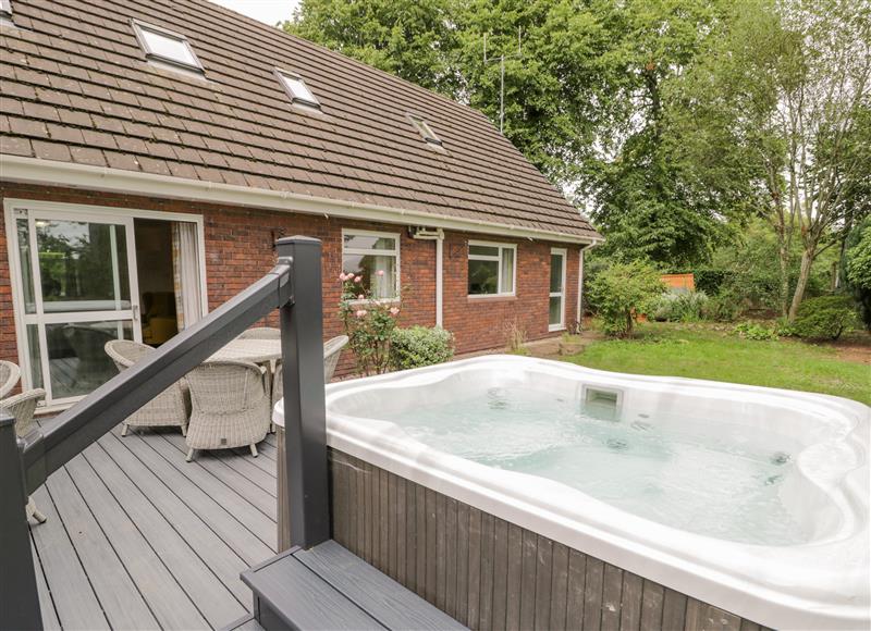 There is a swimming pool at Woodlands Retreat, Llanfwrog near Ruthin
