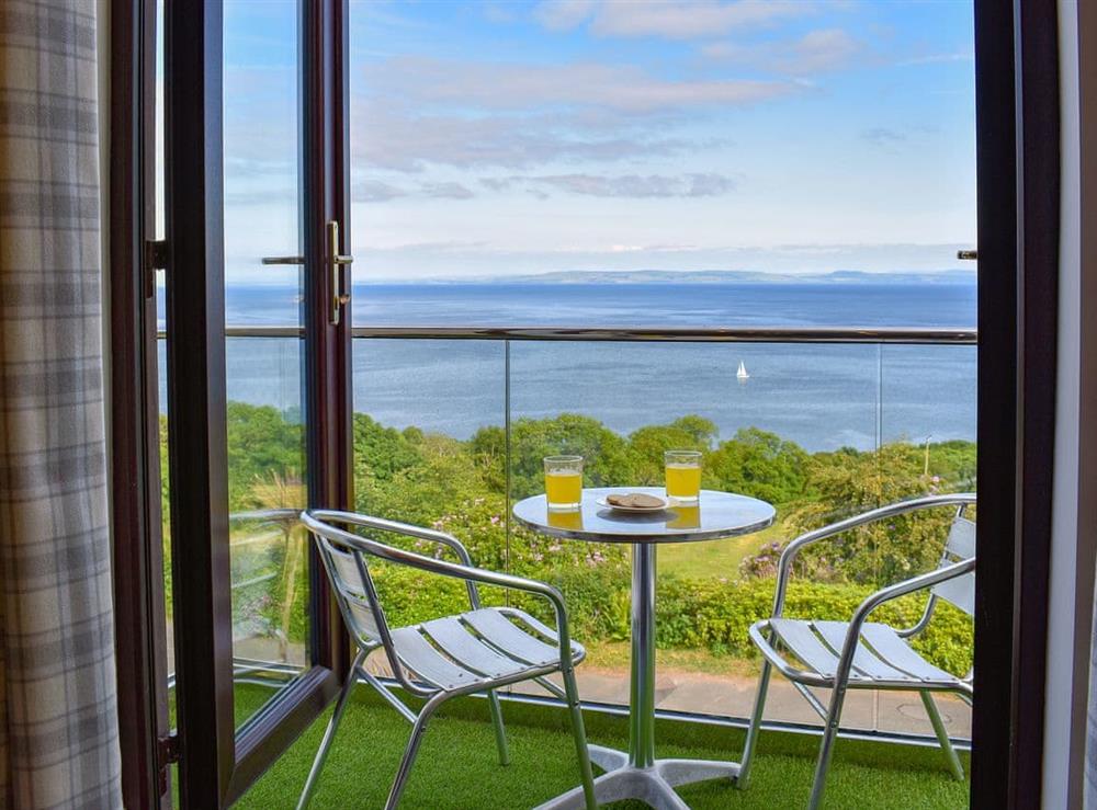 Balcony with fantastic sea views at Woodlea Cottage 1 in Dippen, near Whiting Bay, Isle of Arran, Scotland