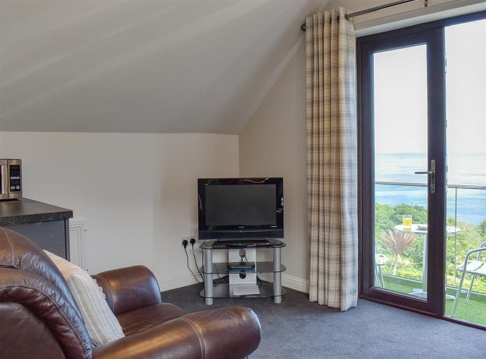 Living area with sea views at Woodlea Cottage 1 in Dippen, near Whiting Bay, Isle of Arran, Scotland