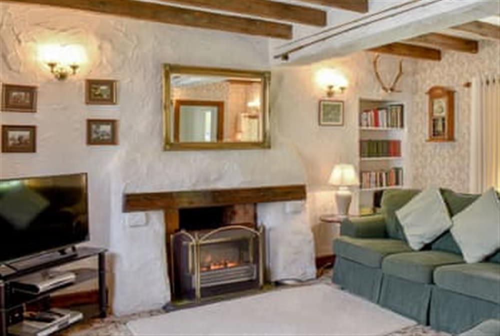 Comfortable living room at Woodlea Cottage 2 in Whiting Bay, near Dippen, Isle Of Arran