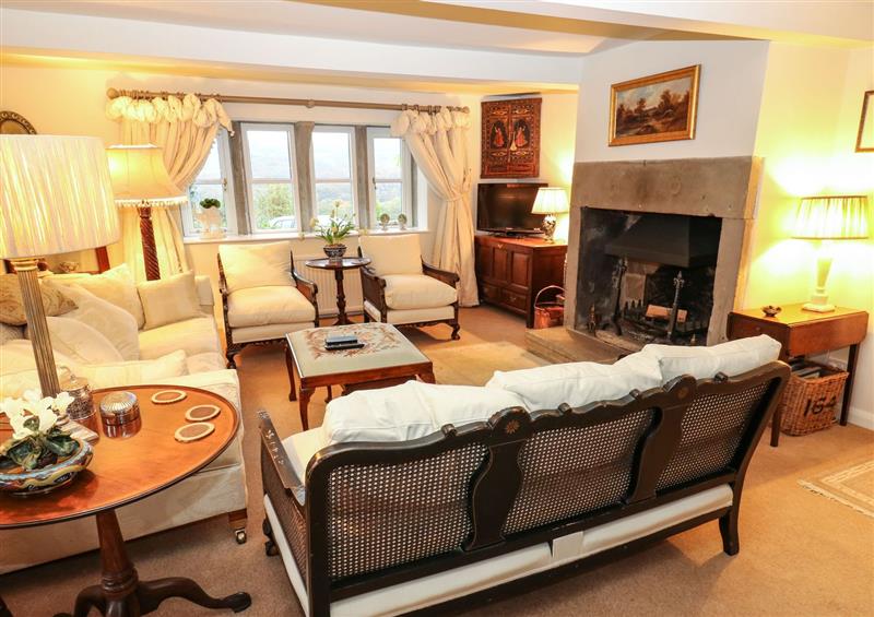 Relax in the living area (photo 2) at Woodlea Cottage, Almondbury