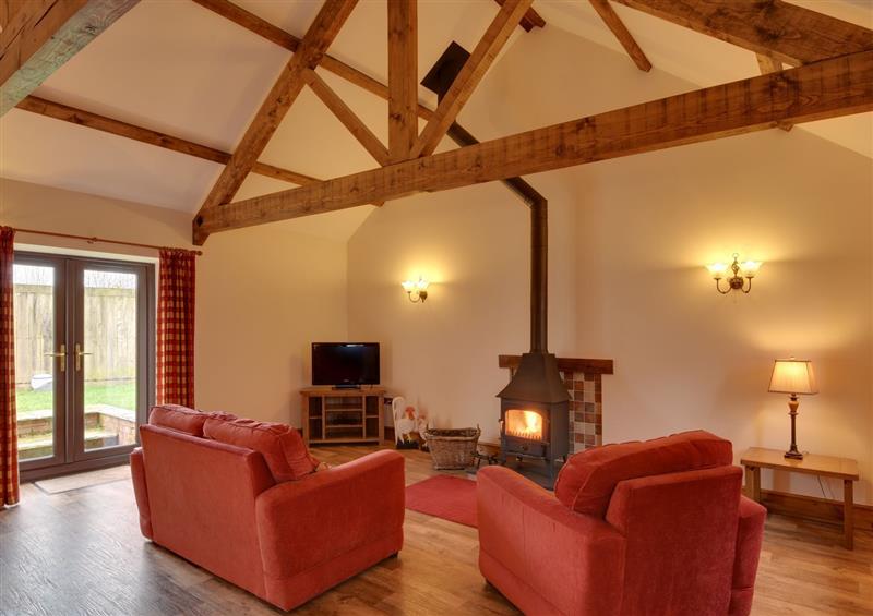 Relax in the living area at Woodpecker Cottage, Bradworthy near Bude