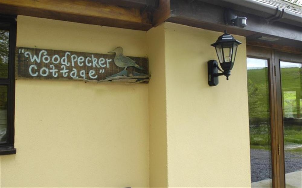 Woodpeckers ext sign at Woodpecker Cottage in Stokenham