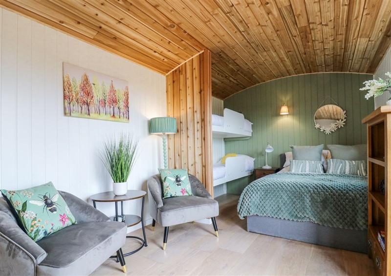 A bedroom in Woodpecker at Woodpecker, Lode near Bottisham