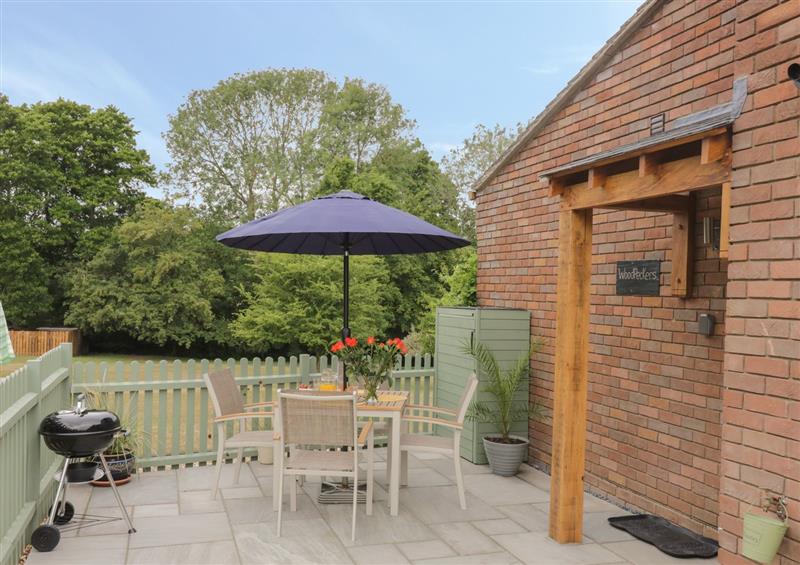 Enjoy a cup of tea on the patio at Woodpeckers, Alresford