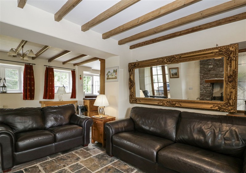 Relax in the living area at Woods Cottage, Kingcoed near Raglan