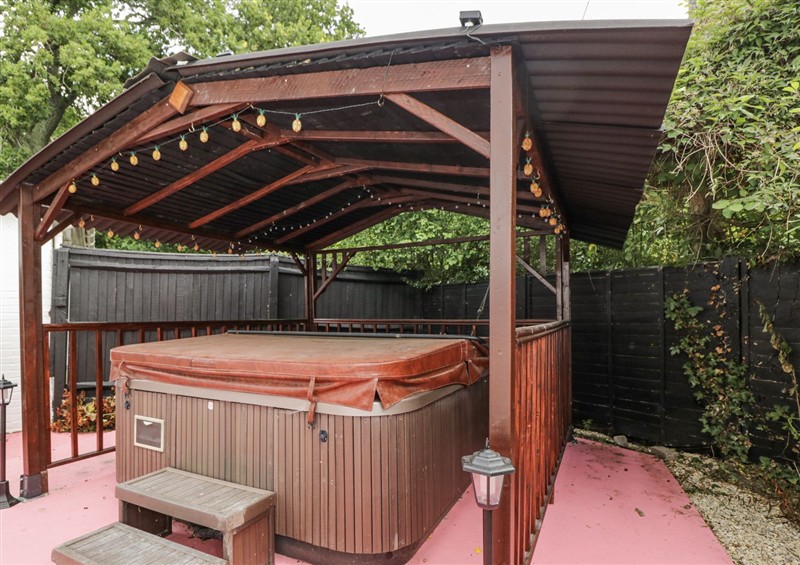There is a swimming pool at Woods Cottage, Kingcoed near Raglan