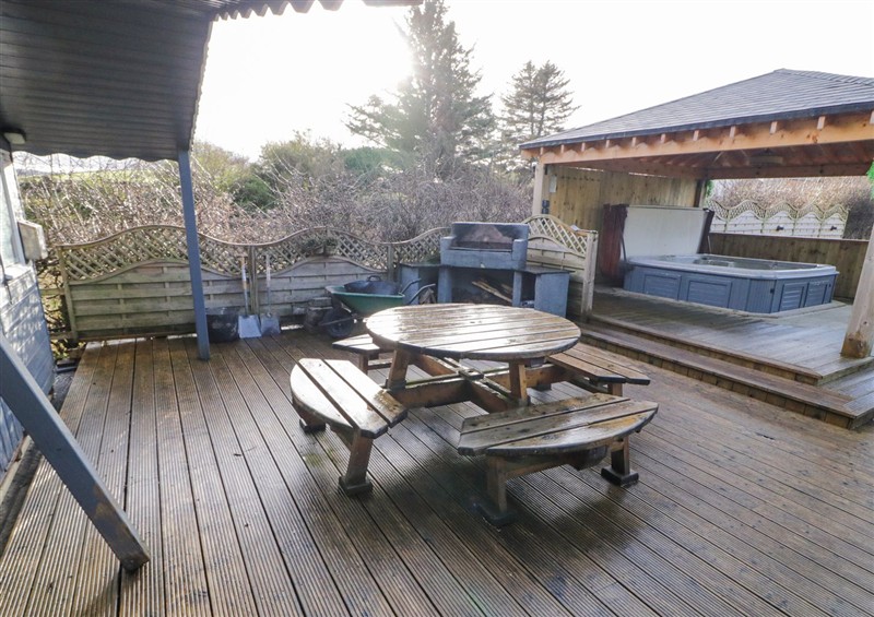 Enjoy a glass of wine on the patio at Woodside Guest House, Castlerock