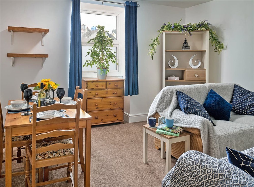 Living room/dining room at Woodview Cottage in Caernarfon, Gwynedd