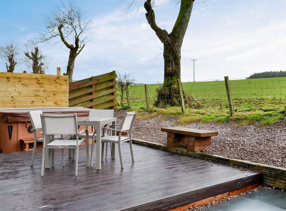 Tranquil patio with hot tub (photo 2) at Woodview in Lochanhead, Beeswing, Dumfriesshire