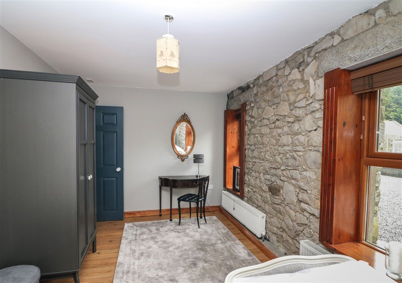 A bedroom in Woodville Lodge at Woodville Lodge, Rhode