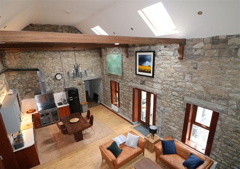 This is the living room (photo 3) at Woodville Lodge, Rhode