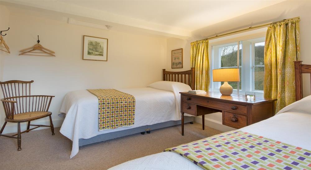 Twin bedroom at Woody's Cottage in Near Ebworth, Gloucestershire