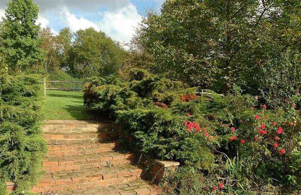 Steps in garden at Woolhouse Barn, Hunton, Kent