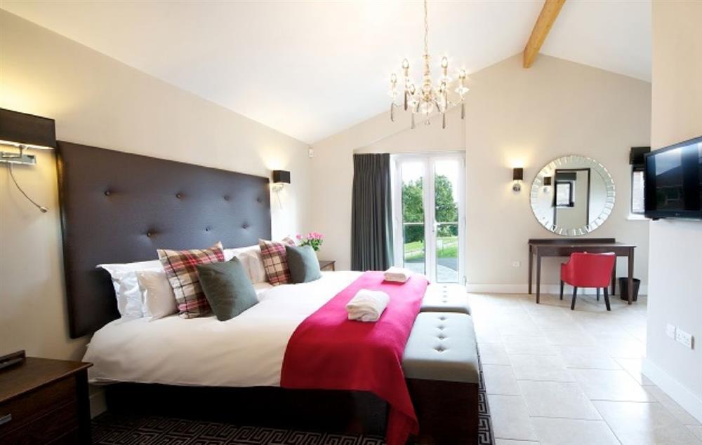A penthouse bedroom at Worcester Pearmain, Stoke by Nayland